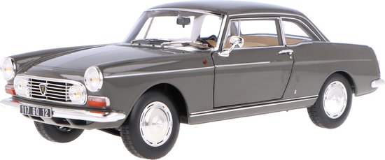 Het 1:18 gegoten model van de Peugeot 404 Coupé uit 1967 in grijs. De fabrikant van het schaalmodel is Norev. Dit model is alleen online verkrijgbaar van Norev